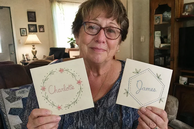 Barbara W. with her finished paper-embroidery